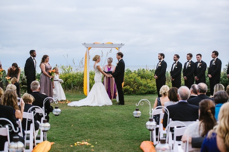 A wedding at the Blockade Runner on the lawn.